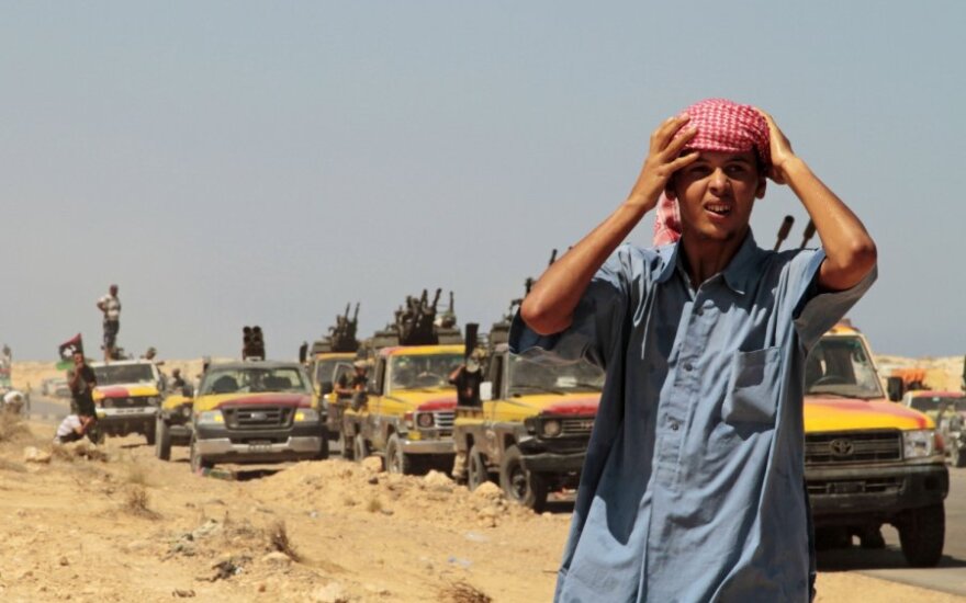 Sukilėliams šturmuojant M.Gaddafi gimtąjį miestą žuvo 11 kovotojų