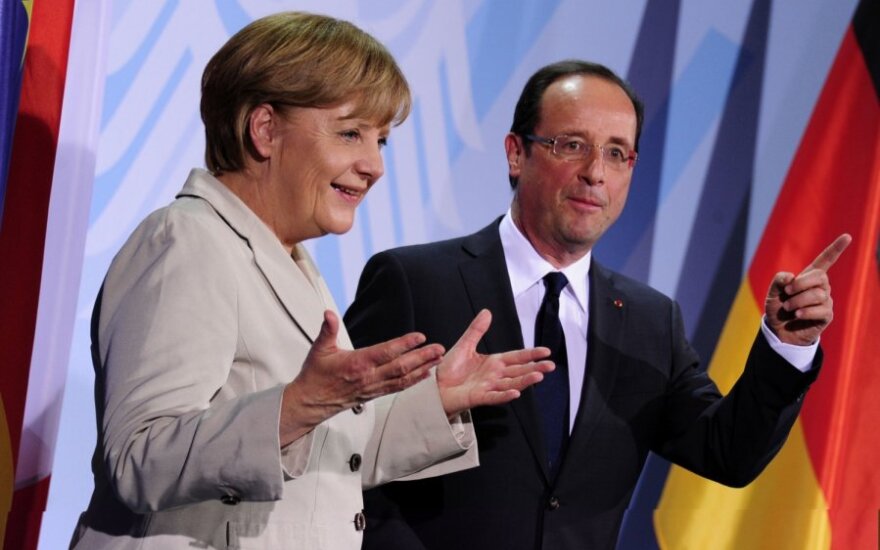 Олланд и Меркель хотят, чтобы Греция осталась в зоне евро