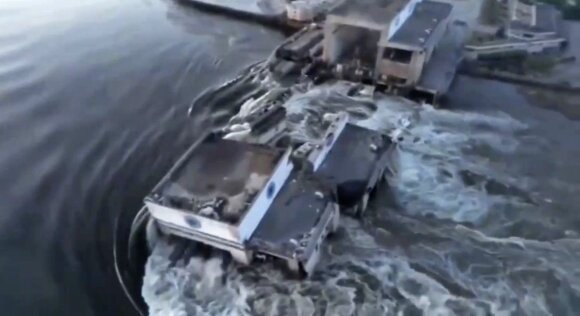 In this image taken from video released by the Ukrainian Presidential Office, water runs through a breakthrough in the Kakhovka dam in Kakhovka, Ukraine, Tuesday, June 6, 2023. Ukraine on Tuesday accused Russian forces of blowing up the major dam and hydroelectric power station in a part of southern Ukraine that Russia controls, sending water gushing from the breached facility and risking massive flooding. Russian officials countered that the dam was damaged by Ukrainian military strikes in the contested area. (Ukrainian Presidential Office via AP)  XEL105