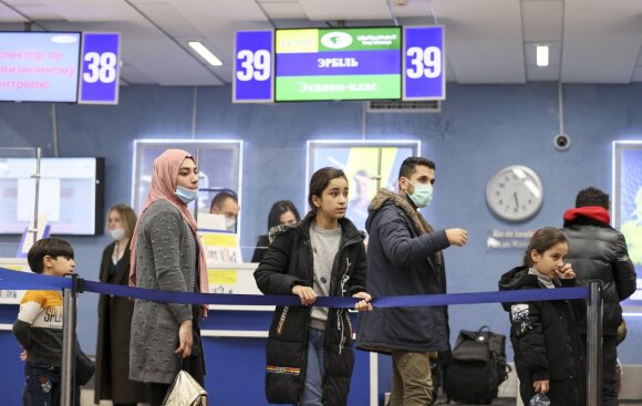 Migrantai ruošiasi kelionei namo