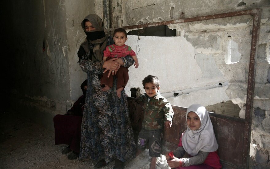 Sirijoje iš apsupto miesto netoli Damasko pasitraukė 620 sukilėlių