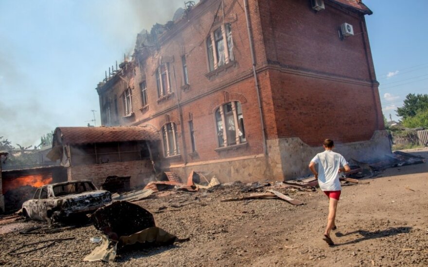 Ukraina: 14-mečio akyse sušaudė šeimą