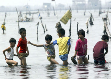 Filipiniečių vaikai ir žvejai